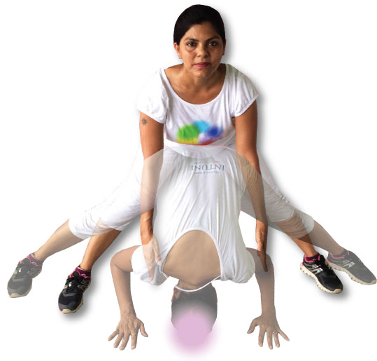 Crown chakra exercises - prone shoulder stretch & wide leg forward bend